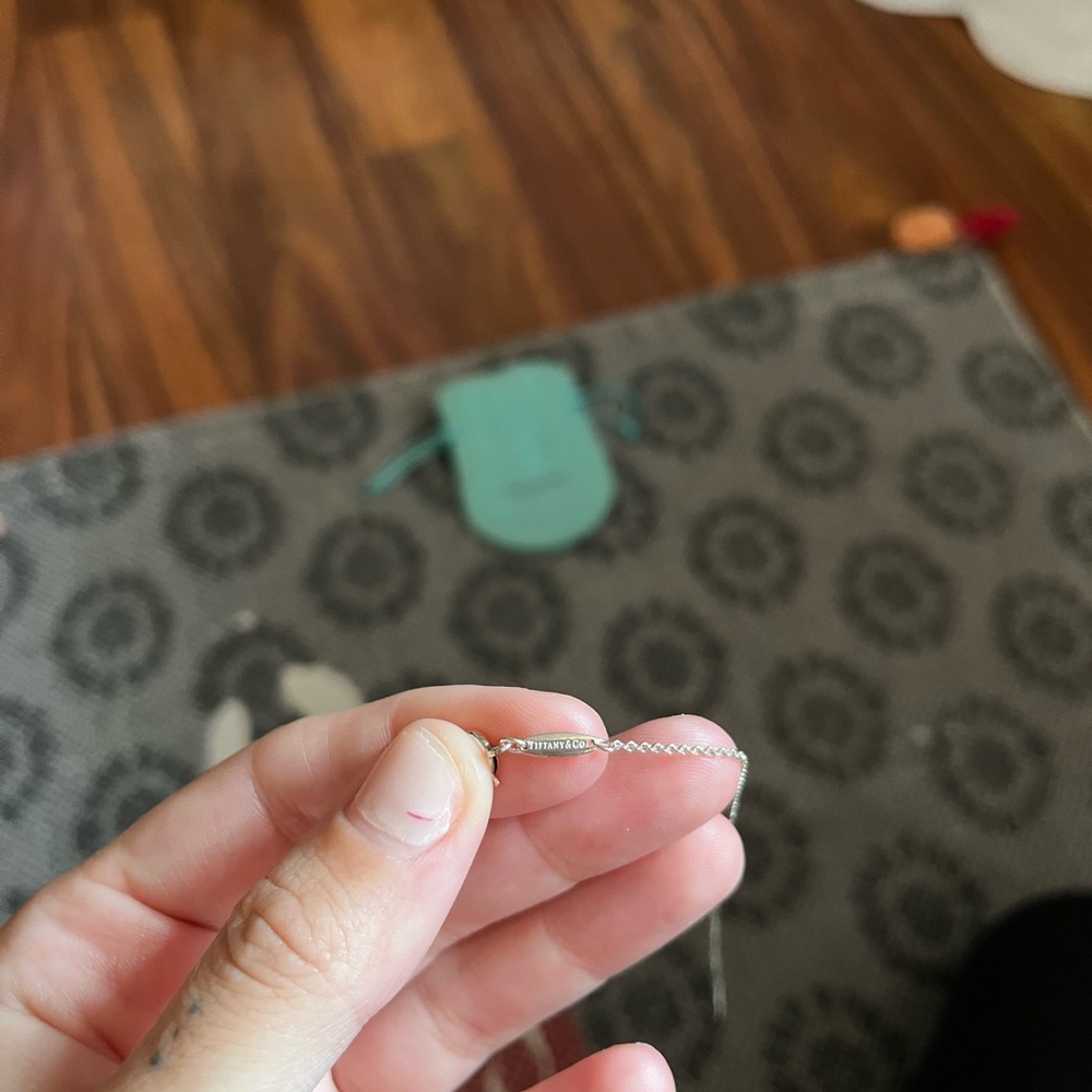 carat is either .18 or .25 carat from Tiffany & Co. about 5 years old.